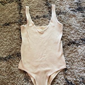 Cream color body suit